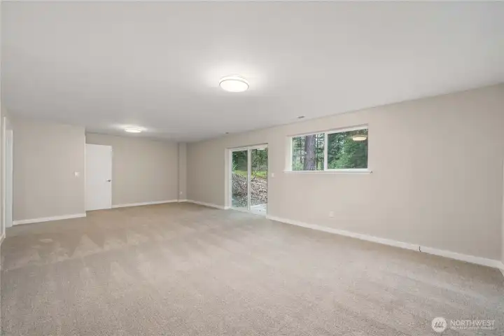 Another angle of the Bonus room, showing the slider to the backyard.