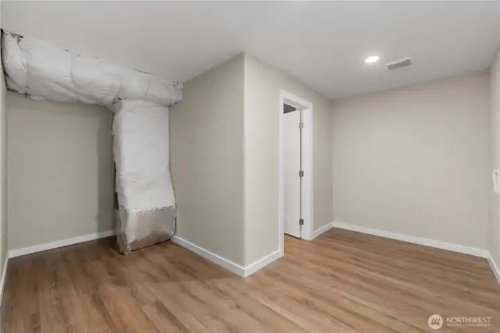 Beyond the office/hobby room is this laundry room (hookups on the right). Straight ahead is the 3/4 bath.