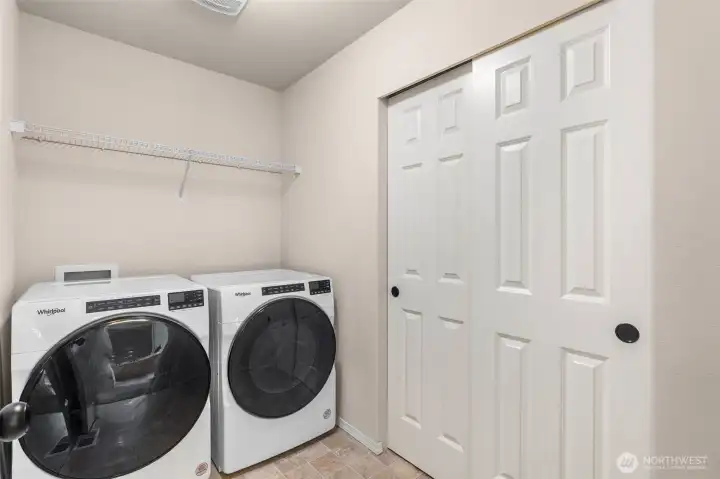 Laundry room with storage closet Laundry room with storage closet