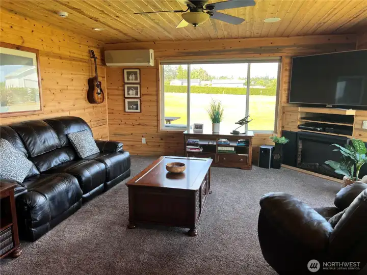 Great room with electric fireplace and split energy efficient system