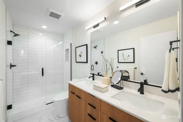 Dual Sink Vanity and BIG tiled shower!  Photos are of a completely different floorplan and are representative of quality and finishes.  Color schemes vary by location.