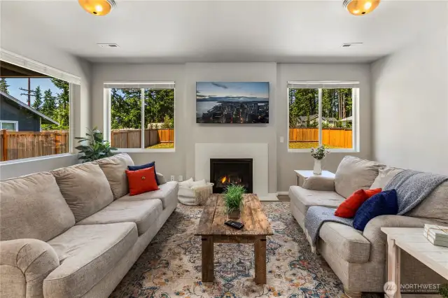 Expansive windows and open-concept living make this space perfect for relaxing or entertaining