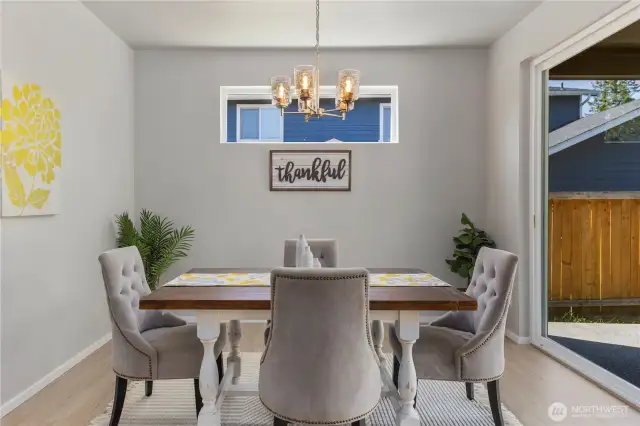 Seamlessly connected dining space flooded with natural light!