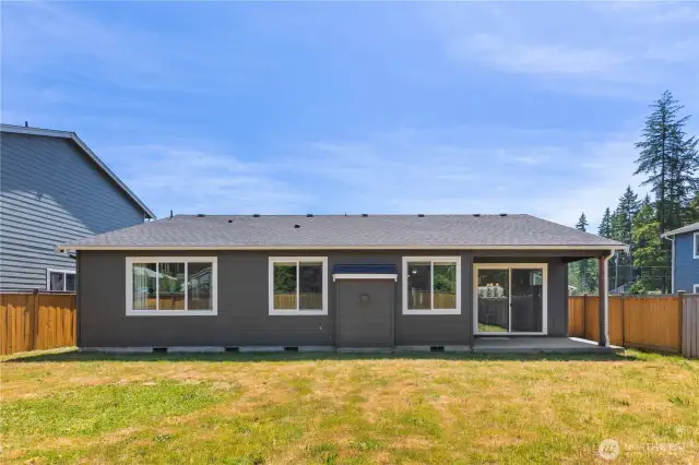 Large, private, fully fenced backyard - perfect for entertaining, relaxing, or play