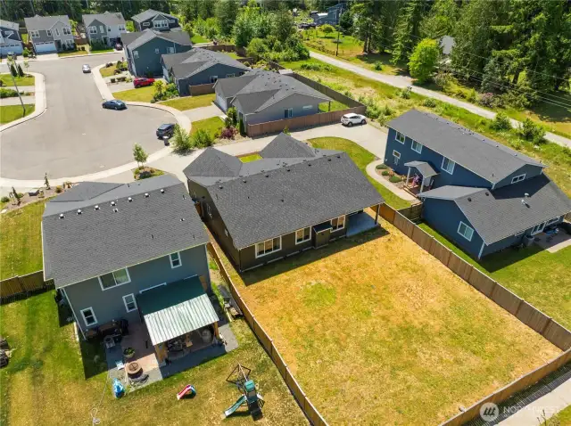 Large, private, fully fenced backyard - perfect for entertaining, relaxing, or play