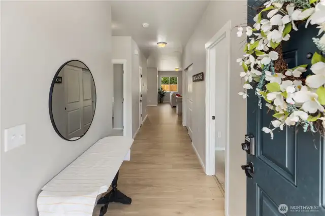 Step into a bright, airy space with high ceilings and a warm, modern welcome.