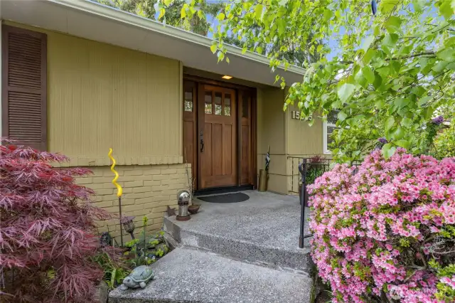 Walkway leads to front door. Level access provided by garage entry.
