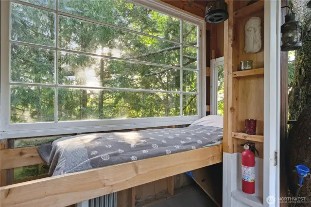 Bed for relaxing or spending the night in the treehouse.