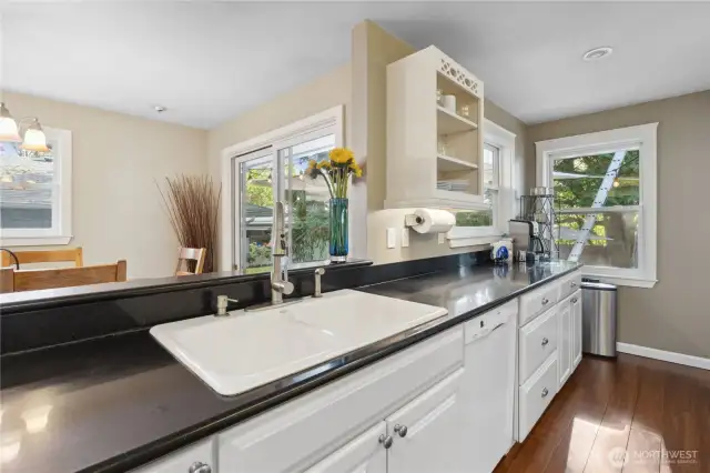 Sleek countertops provide ample work space for the home chef.