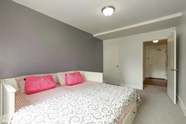 Bedroom with ample closet space