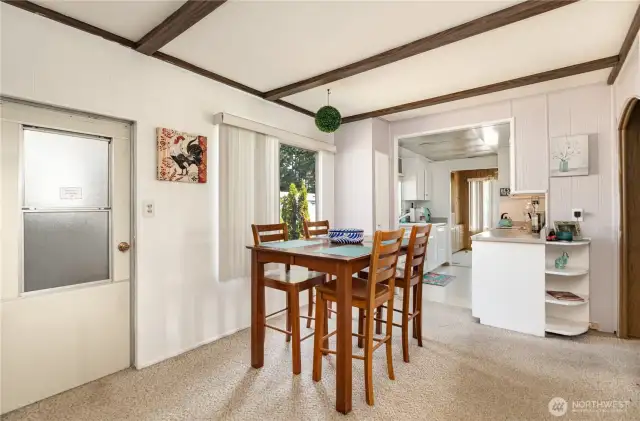 Informal dining area is conveniently located off the kitchen.