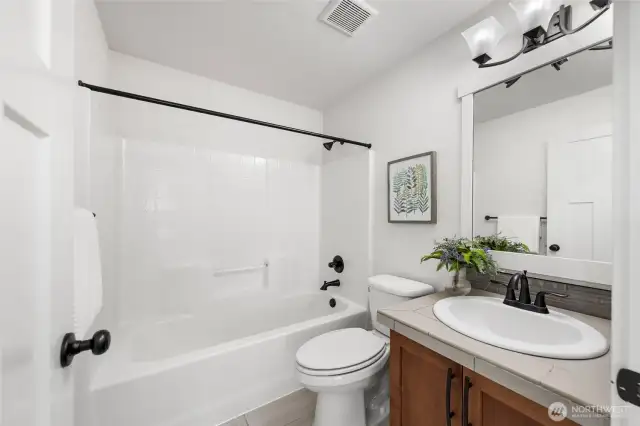 Hallway bath on the upper floor.