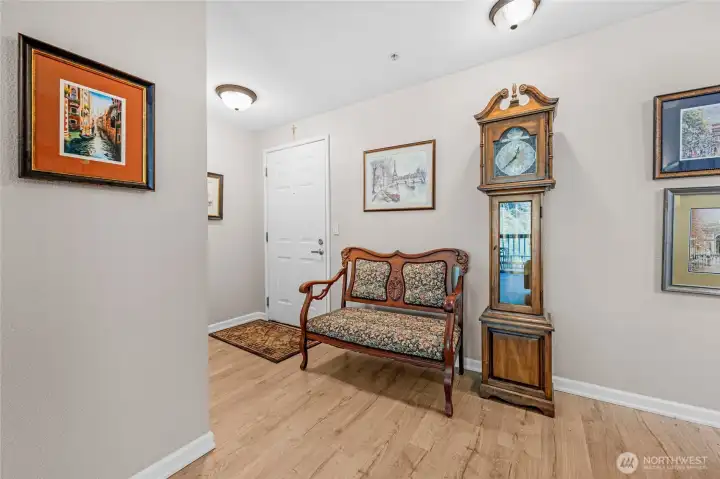 Large open entry way and new flooring.
