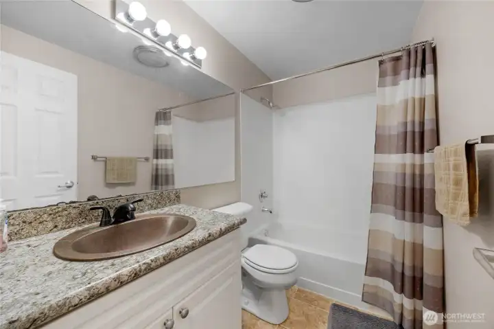 Full bath new granite countertops installed.