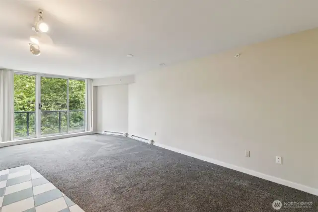 Enjoy peace and privacy with a wall of windows and charming Juliet balcony.