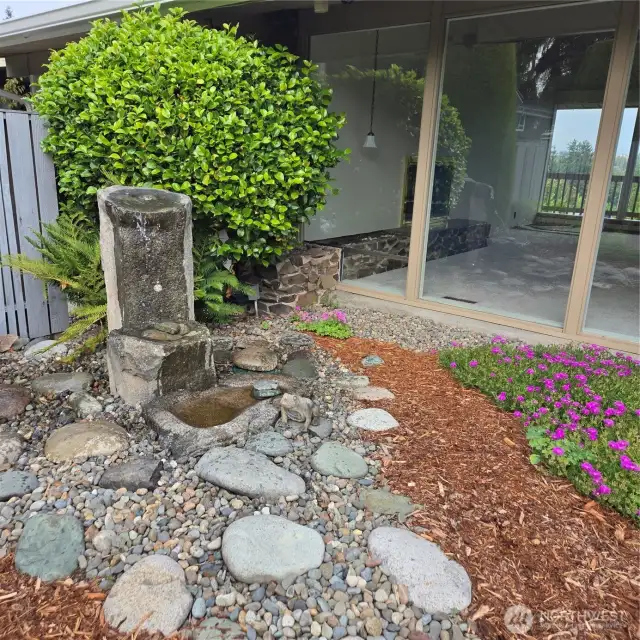 The fountain is a pleasant way to watch and listen to in the front yard