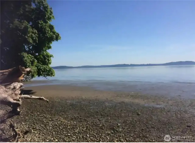 property includes almost 100' of beach with tideland rights (aka lots of yummy shellfish!)