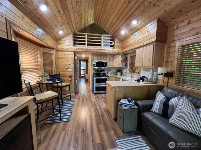 LIVING, BUILT IN CABINET WITH FIREPLACE, KITCHEN