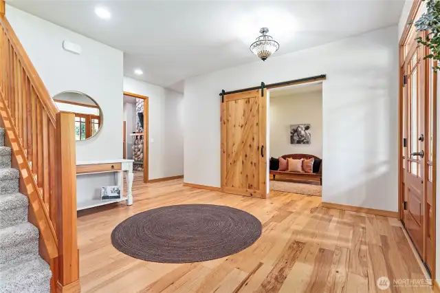 Just inside the entry is an office with a barn door