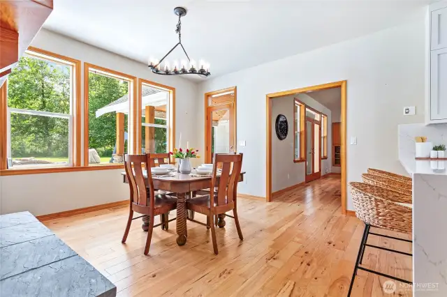 The light and bright breakfast room faces the pool