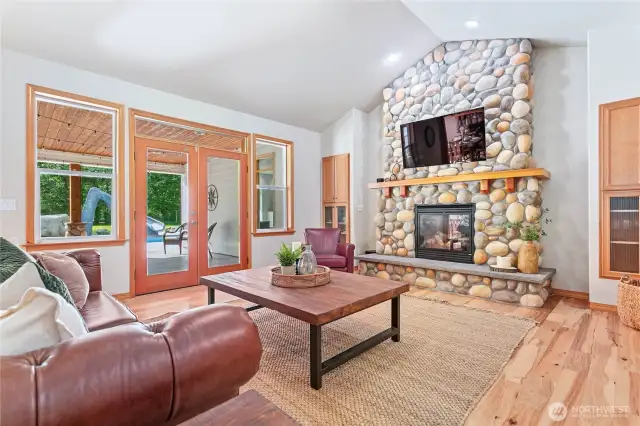 The great room is just inside, with French doors that open up to the pool deck