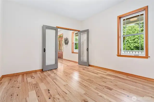 Dining Room with French doors, which could be a second office downstairs
