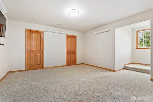 Large upstairs bedroom with 2 closets, ensuite bathroom, and a reading or desk nook in the dormer area