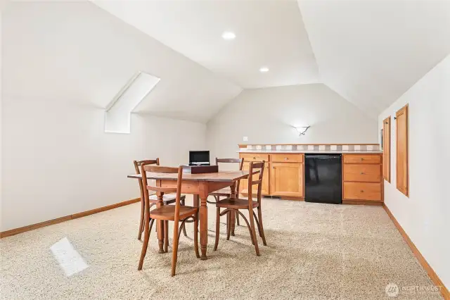 The upstairs bonus room has a wet bar