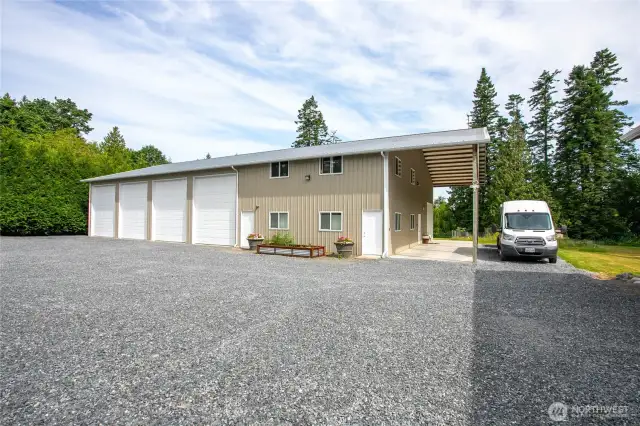 The ADU entrance is through the side door, attached to the shop. It is a 1-bed, 1-bath with kitchenette. There are large covered areas for storage on the back of both shops
