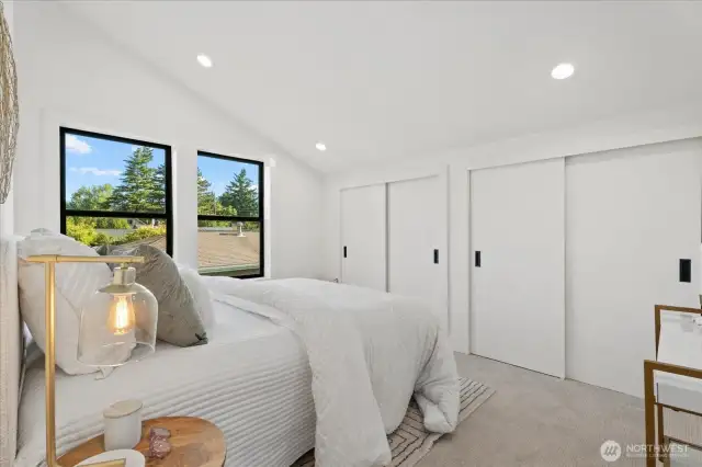 2nd upstairs bedroom; contains tons of storage along the far wall.  All upstairs bedrooms have their own mini-split head unit.