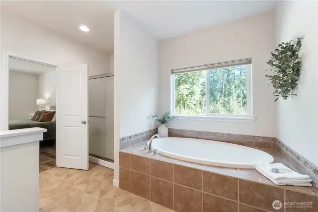 Soak your cares away in the tub or take a shower, if you prefer!