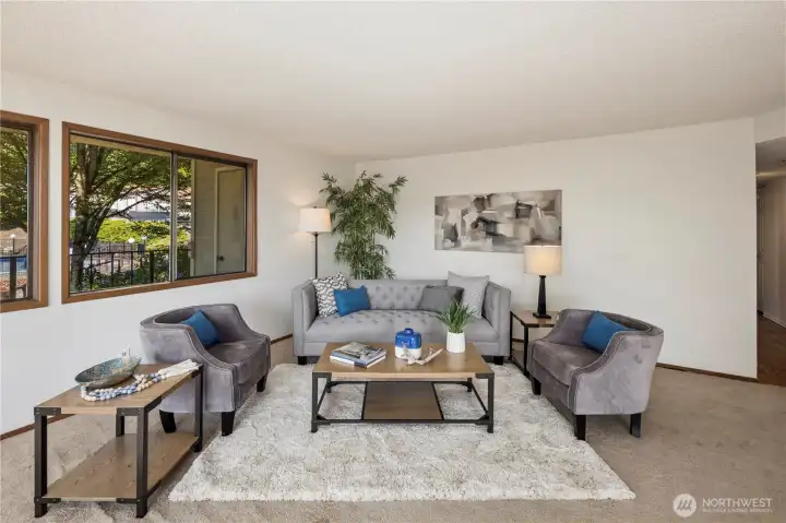 Living room with views of the pool.