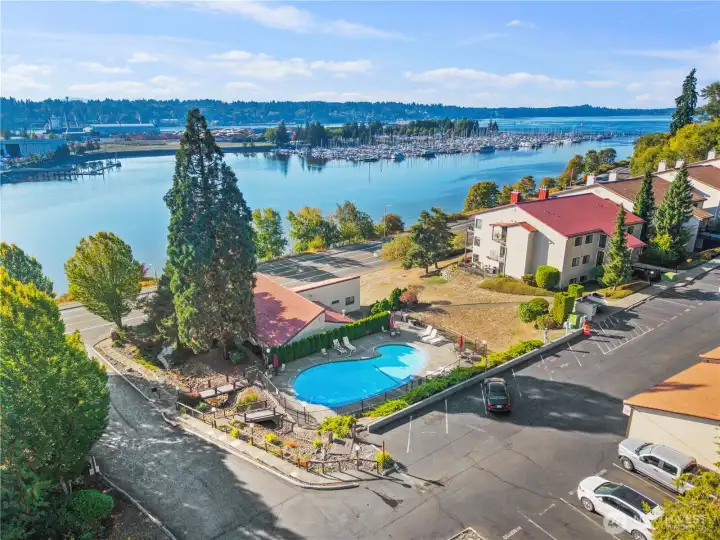 Amenities include swimming pool and clubhouse.