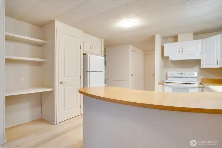 A brand-new refrigerator makes moving in easy, while adjustable LED lightbulbs in the fixture let you set the perfect mood.