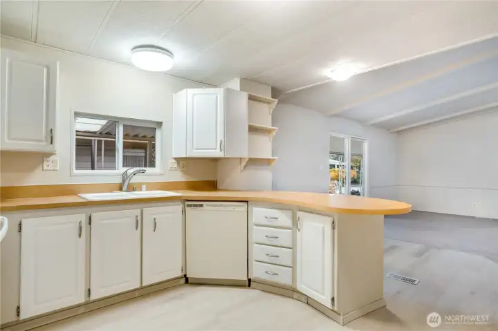 Plenty of countertop space for meal prep—and a stylish peninsula that connects seamlessly to the living area, perfect for casual dining or entertaining.