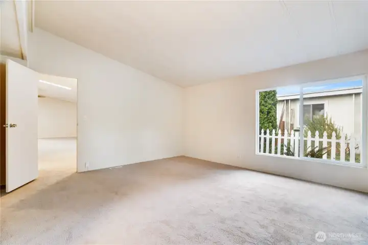 Fresh paint and new carpet make this space feel like new.