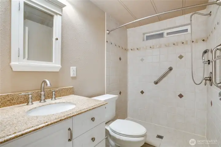 The second bath offers convenience for guests or family—a practical ¾ bath for everyone.