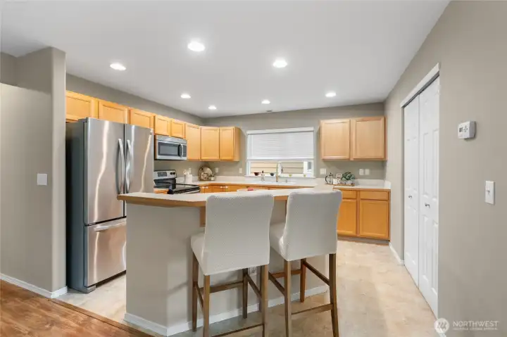 Kitchen with breakfast bar, lots of cabinet and counter space