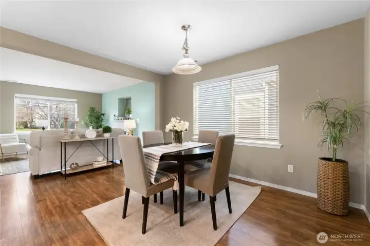 Elegant dining room flows to living room