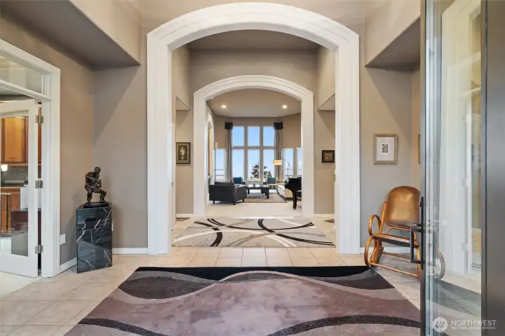 Front Entry, soaring ceilings, tiled floors