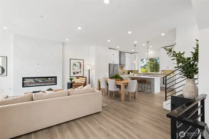 Open main floor Gathering room with 10' ceilings and fireplace included! (Facade, Ext Colors, Interior Photos & Floor Plans for illustrative purposes only. Actual Facade, Ext Colors, Interiors & Floor Plans may differ.)