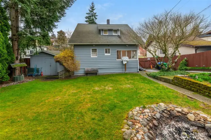 Great shot of the back yard fire pit.  The shed is 10x12 and provides space for tools or toys.  The exterior of the home is in excellent condition as is the rest of the house.
