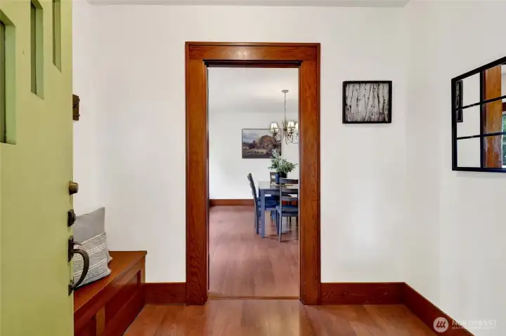 Step inside to a true foyer that sets the tone for the home's timeless character. Wide trim and wood detailing showcase the craftsmanship that never goes out of style.