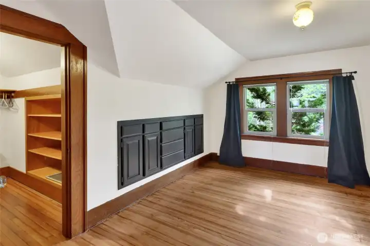 Bedroom #2 also features more built-ins plus a large-walk-in closet. No shortage of storage in this house!