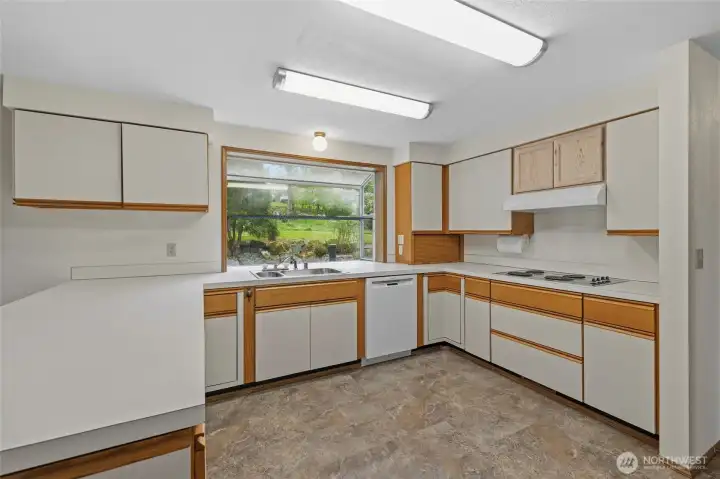 Kitchen with ample cabinetry and storage space