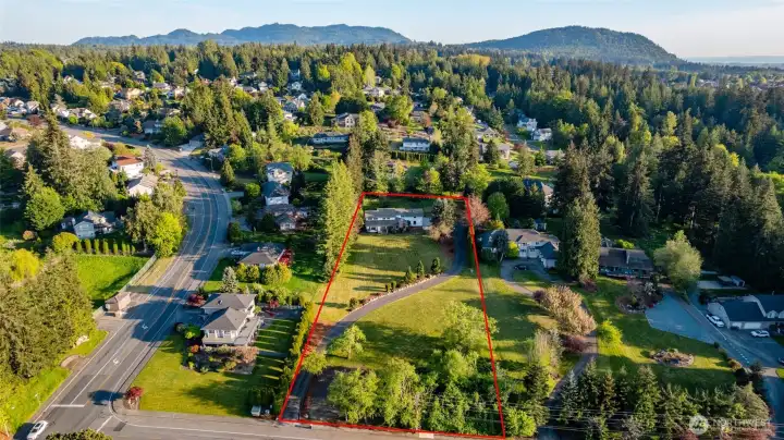 Aerial perspective showcasing the expansive 2-acre property