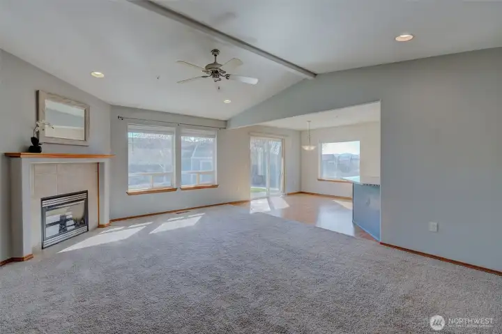 Open concept living space with seamless flow between living, dining, and kitchen—ideal for entertaining