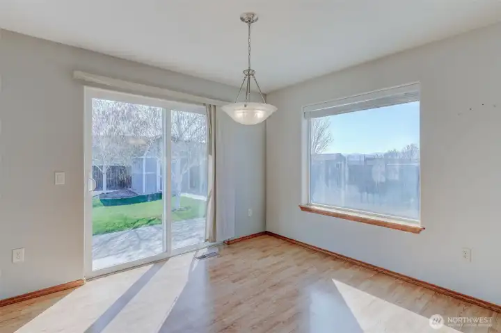 Dining area positioned off kitchen with great natural light and easy access to outdoor entertaining spaces.