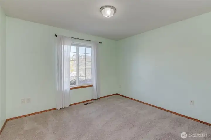 Bedroom 2 offers flexibility for guests, home office, or growing household needs.