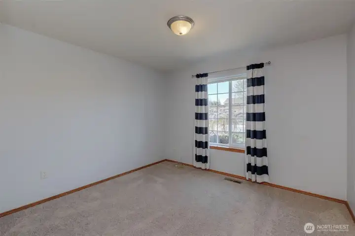 Bedroom 3 provides additional sleeping space, office potential, or hobby room versatility.